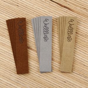 5 Label zum Aufnähen – „Wollliebe“ – grau